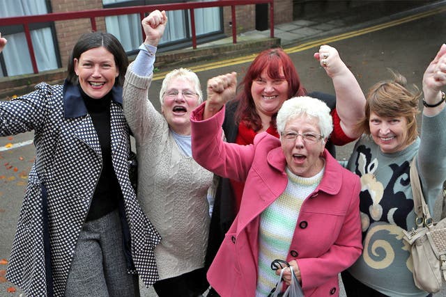 Current and former Birmingham Council workers celebrate after yesterday's Court judgement