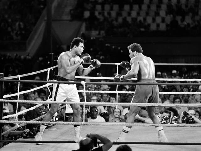 <p>Muhammad Ali (left) and George Foreman squared off in a classic </p>