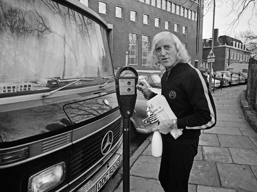 Jimmy Savile outside his motor home in 1969