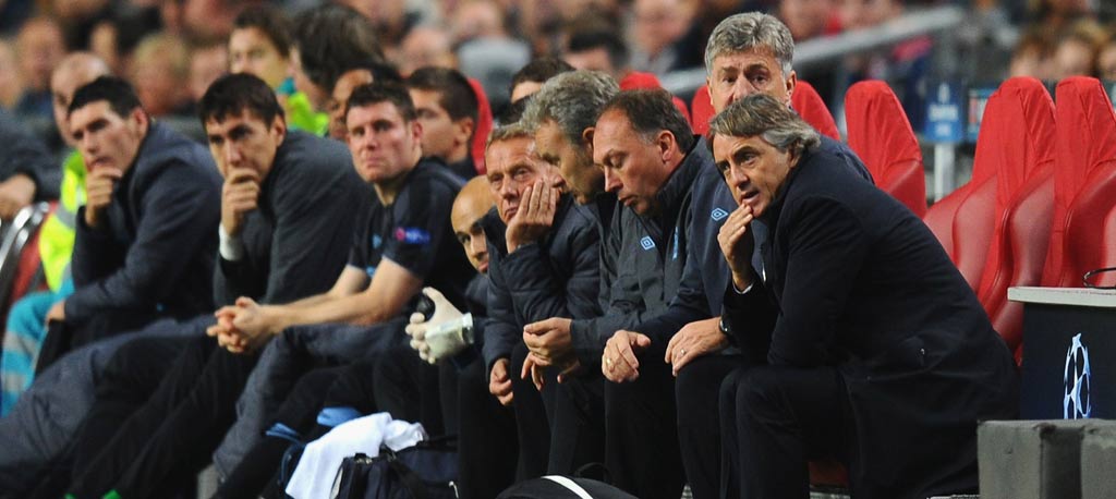Mancini looks on during the defeat to Ajax