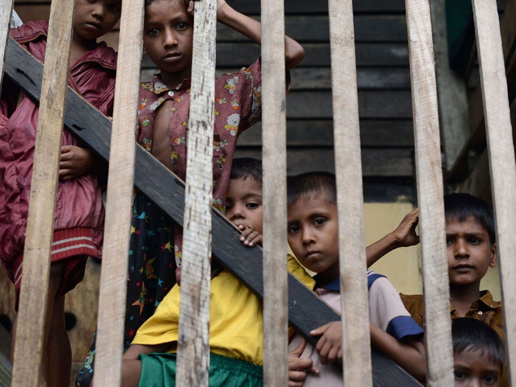 Muslim children from the Rohingya ethnic group at a refugee camp in the state capital