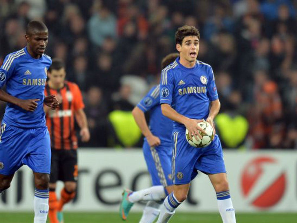 Oscar grabs the ball after scoring a consolation goal for Chelsea against Shakhtar Donetsk in the Champions League this week