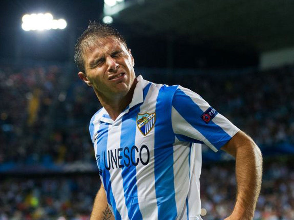 Malaga’s Joaquin Sanchez made amends for a missed penalty