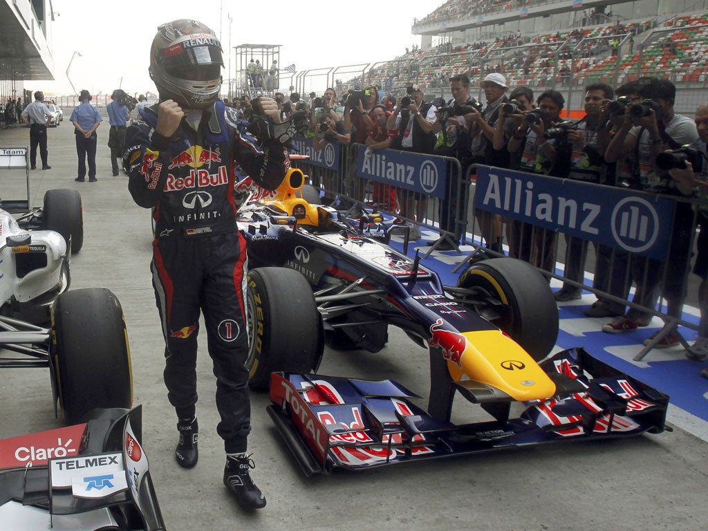 Well Red: Sebastian Vettel leads a Red Bull one-two in qualifying