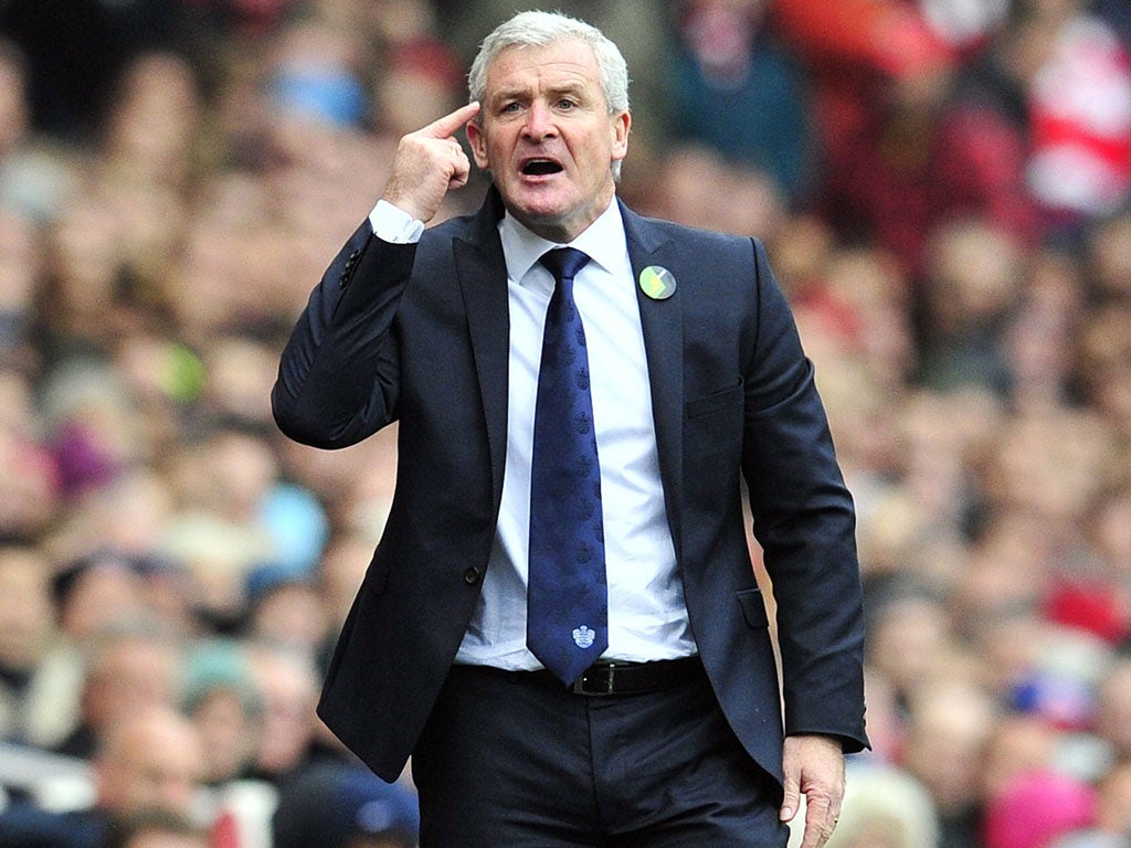 Mark Hughes was left raging at a referee’s decision that cost his struggling side an unexpected point away to Arsenal