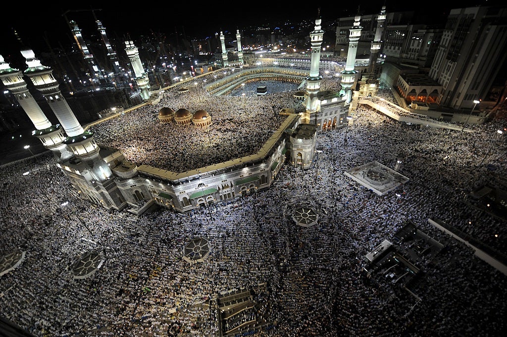 Tens of thousands of Muslim piligrims perform the evening prayer in the holy city's Grand Mosque on November 2, 2011.
