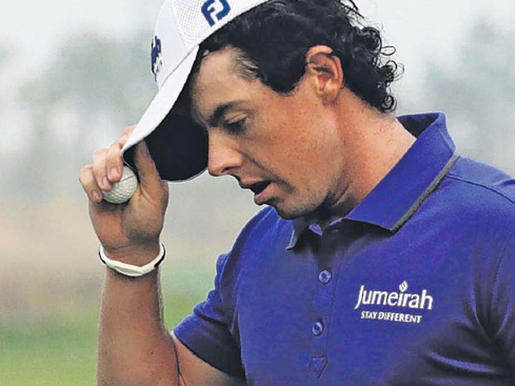 Rory McIlroy reacts after missing a birdie putt on the 18th green in Shanghai