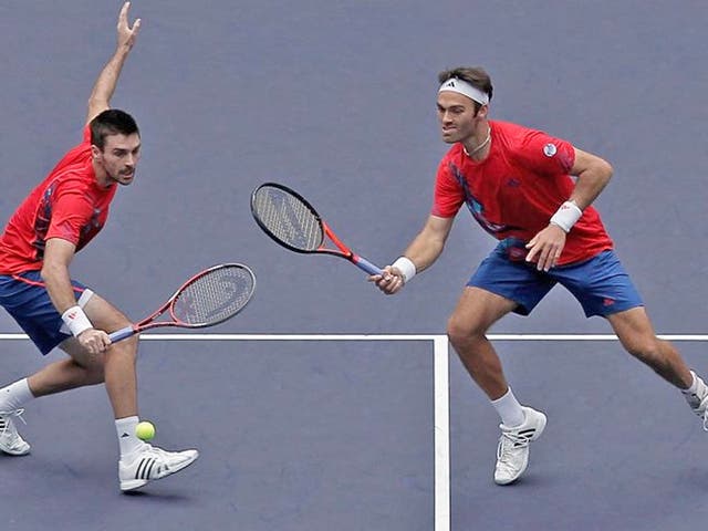 Ross Hutchins (right) and Colin Fleming in action in the Shanghai
Rolex Masters