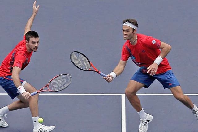Ross Hutchins (right) and Colin Fleming in action in the Shanghai
Rolex Masters