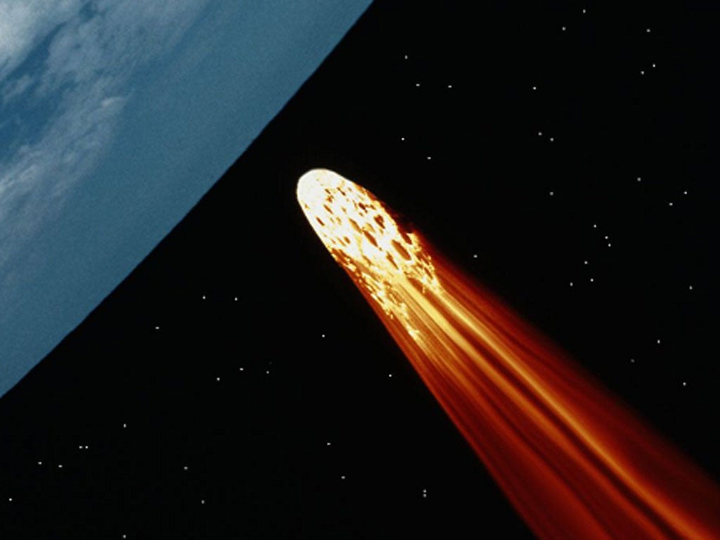 An asteroid is pictured hurtling towards Earth