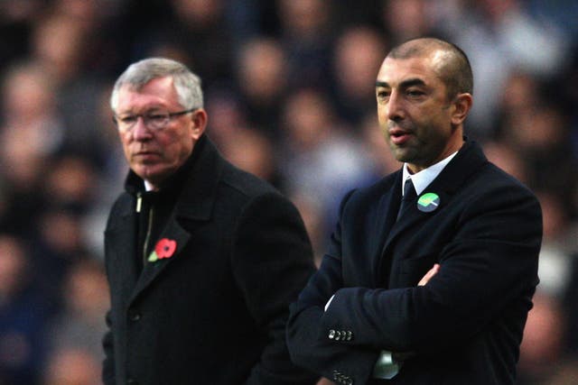  Managers Sir Alex Ferguson of Manchester United and Roberto di Matteo of Chelsea watch from the touchline