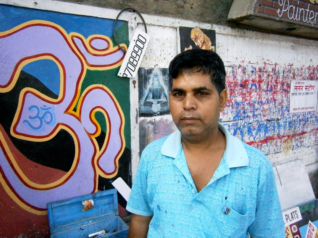 Sunil Kumar, who uses the name Painter Umang, whose hand-painted fonts are among those collected by a new project designed to save one of India's traditional skills