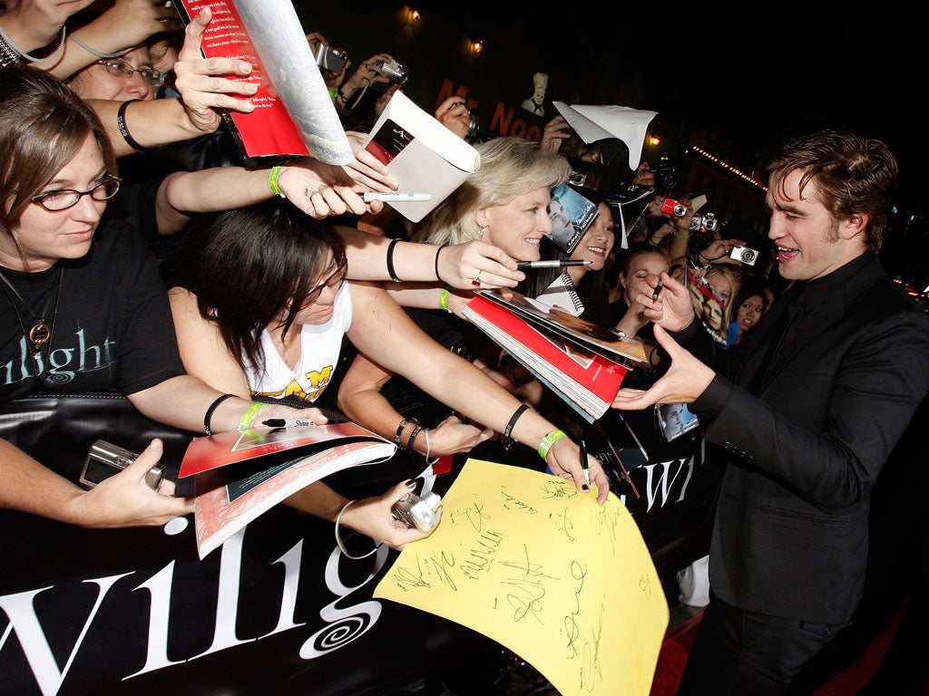 Actor Robert Pattinson arrives at the film premiere of Summit Entertainment's 'Twilight' held at the Mann Village and Bruin Theaters on November 17, 2008 in Westwood, California.