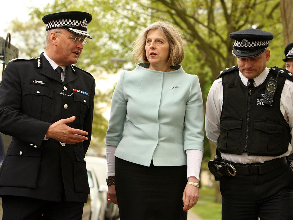Home Secretary Theresa May and Metropolitan Police Commissioner Sir Paul Stephens visit the York Road Estate, Clapham on May 13, 2010 in South West London, England.