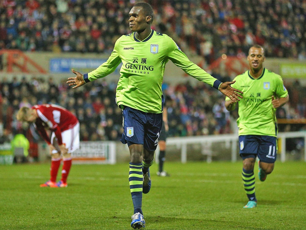 Christian Benteke celebrates scoring the winning goal for Villa