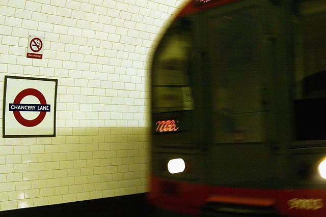 A train arrives at Chancery Lane station on the Central Line