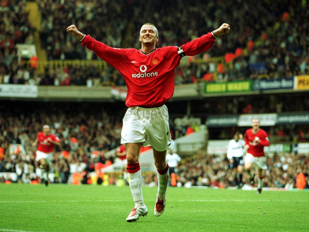 David Beckham celebrates scoring for United in 2001