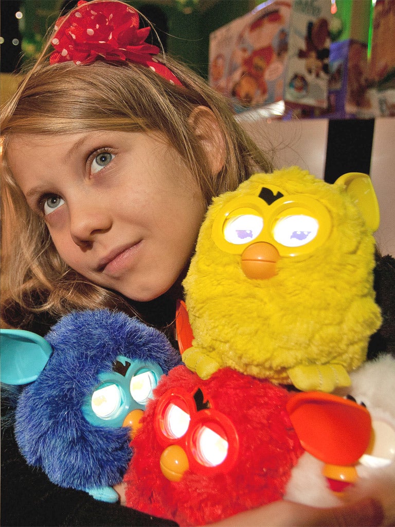Nancy Donaldson falls for Furby. 'I liked the way you could feed him by sliding food from a phone or iPad,' she said.
