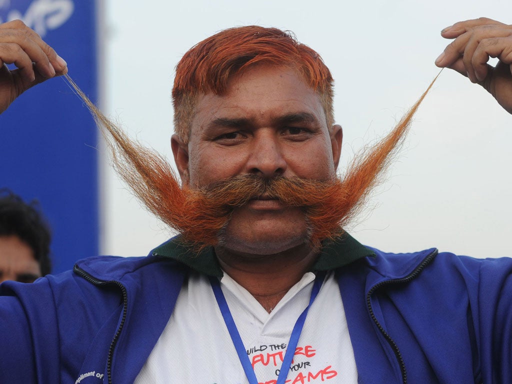 Saddi Muhammad achieved a record by using his moustache to pull a 1.7 tonne pickup truck a distance of 60.3 metres. That's Mo-power.