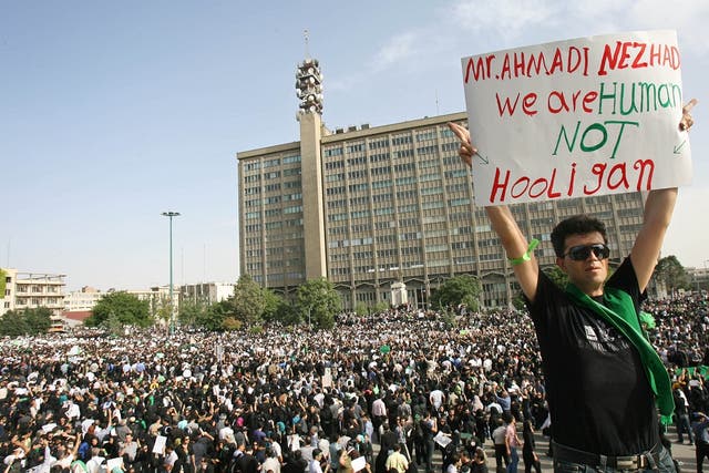 Iranian supporters of defeated reformist presidential candidate Mir Hossein Mousavi demonstrate on June 18, 2009 in Tehran, Iran.