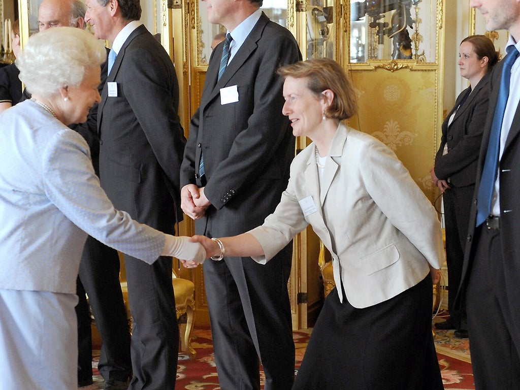 The Queen meets Dame Helen Ghosh at a reception for winners of the Queen's Awards for Enterprise at Buckingham Palace in 2010