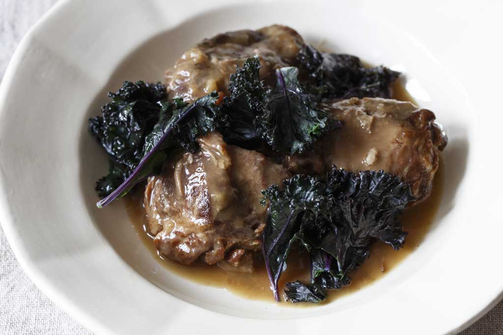 Braised pork with cider and curly kale