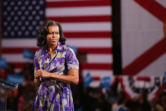  First Lady Michelle Obama speaks during a campaign rally at the James L. Knight Center on November 1, 2012 in Miami, Florida. The presidential campaigns are in their final days before the November 6th general election.
