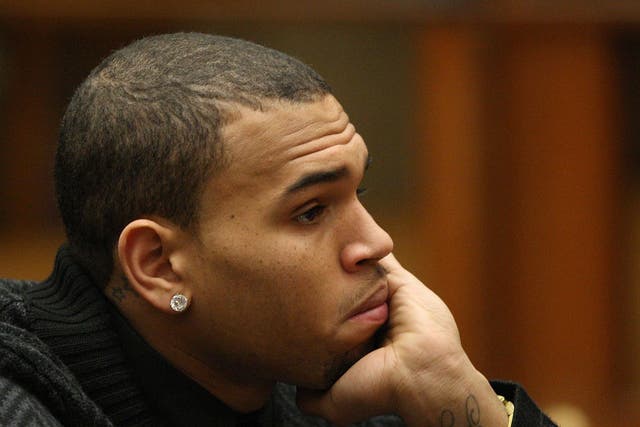 R&B singer Chris Brown appears in court for a probation progress report hearing on January 28, 2011 in Los Angeles, California. Brown pleaded guilty to assaulting his then-girlfriend, singer Rihanna.