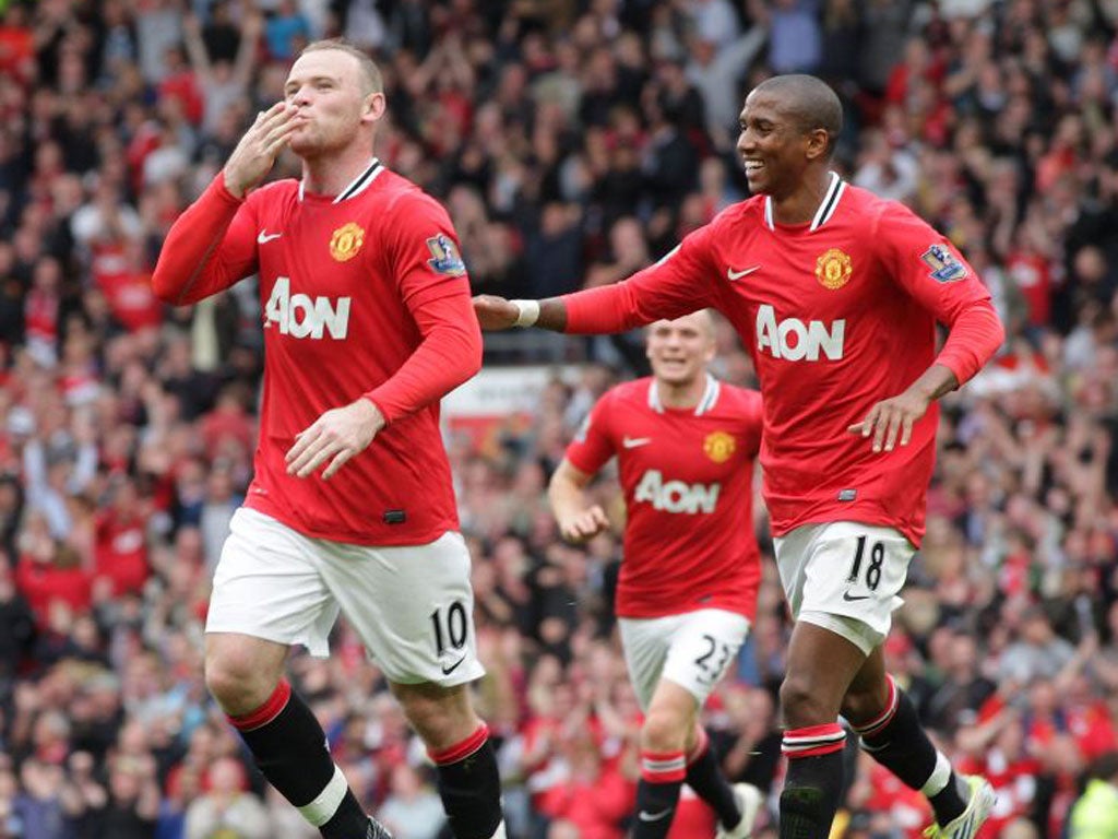 Wayne Rooney celebrates his second goal in Manchester United's 8-2 drubbing of Arsenal last year