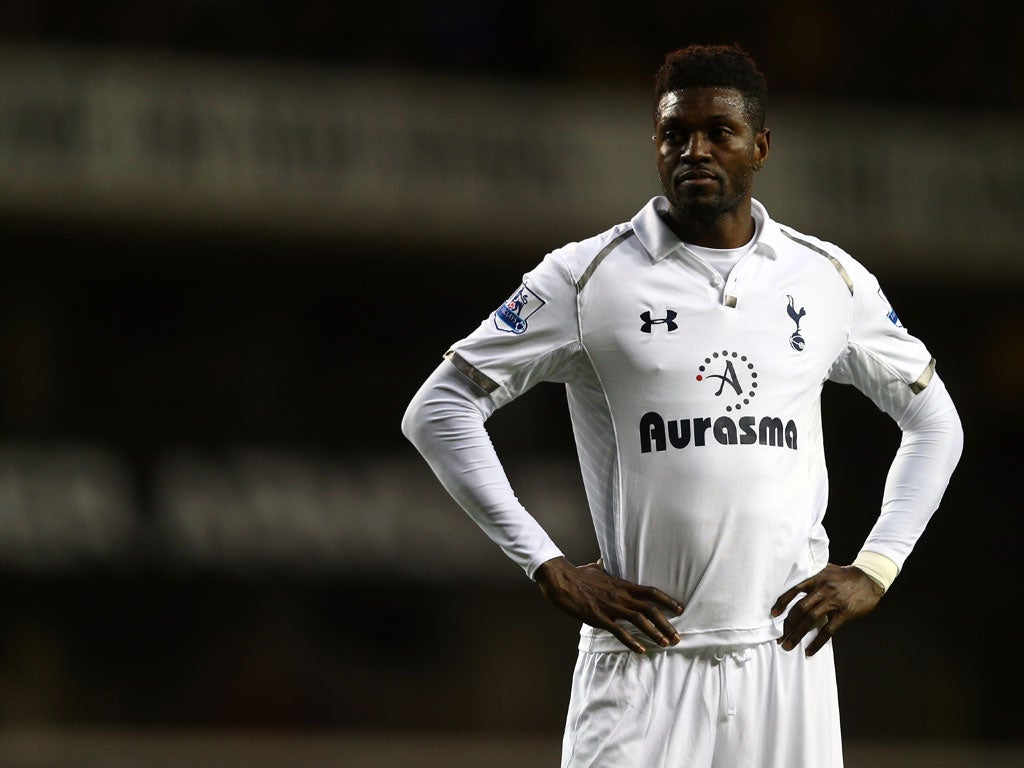 Adebayour of Tottenham appears disappointed at his team's performance