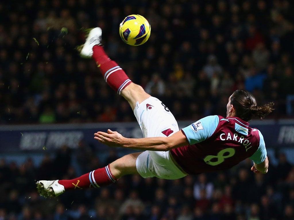 Andy Carroll of West Ham attempts a magnificent bicycle kick against Manchester City
