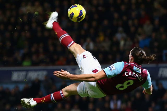 Andy Carroll of West Ham attempts a magnificent bicycle kick against Manchester City