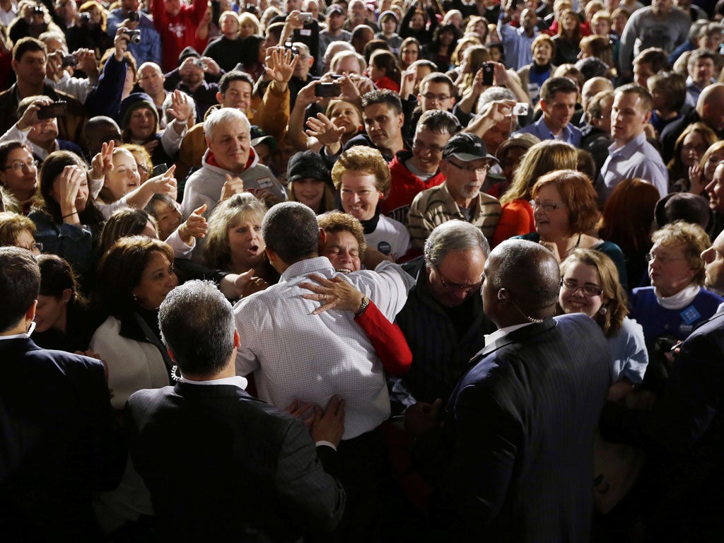 Talking shop: Barack Obama connecting with voters in Ohio yesterday