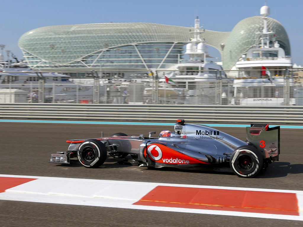 Eastern delight: McLaren’s Jenson Button drives the Yas Marina Circuit in final qualifying for the Abu Dhabi Grand Prix