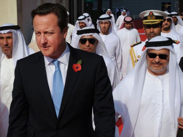David Cameron arrives at the World Trade Centre in Dubai where he visited a trade fair called The Big Five