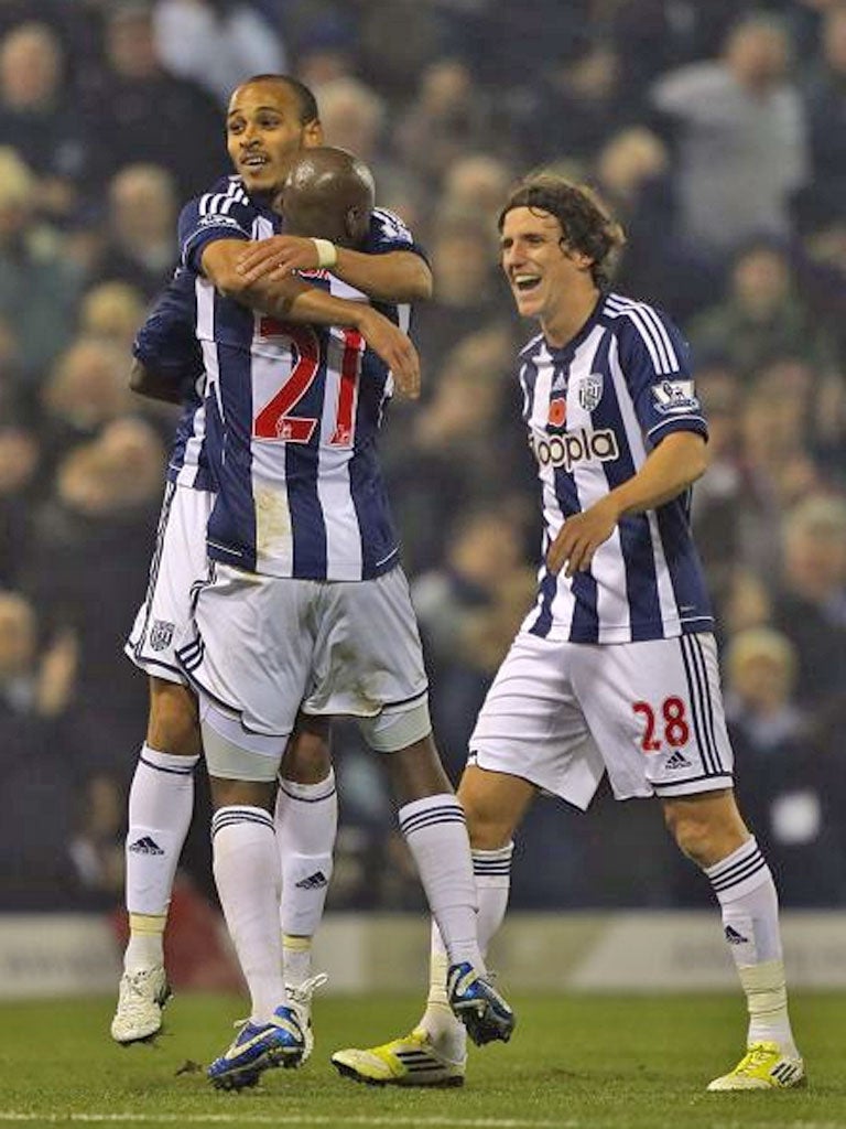 Peter Odemwingie is congratulated for the first of his two goals
last night