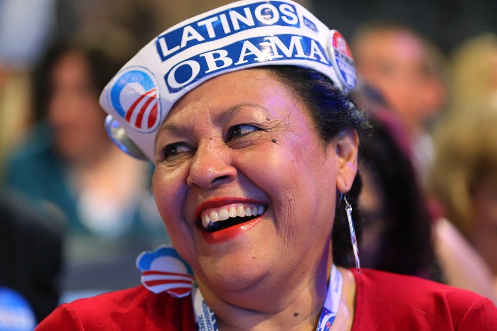 Delegate Antonia Gonzalez of Seattle, WA wears a Latinos for Obama hat during day one of the Democratic National Convention