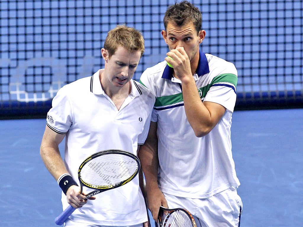 Jonny Marray (left) and Freddie Nielsen talk tactics on the way to victory
