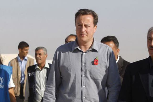 David Cameron arrives at the Al Zaatari camp for Syrian refugees