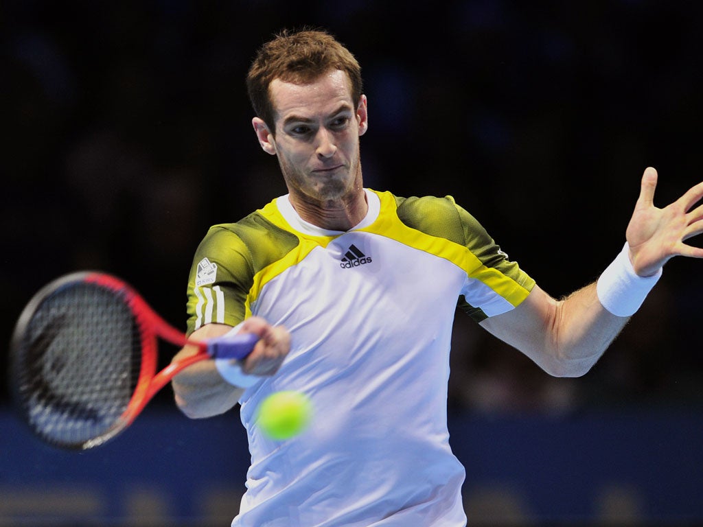 Britains Andy Murray returns against Serbia's Novak Djokovic