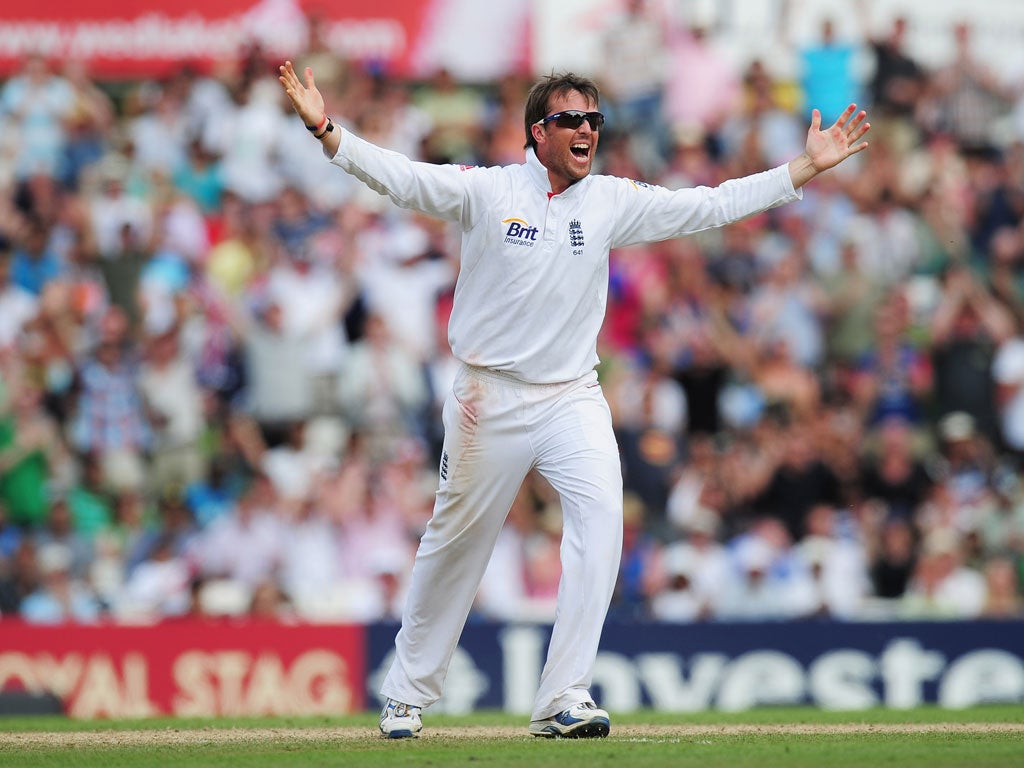 Graeme Swann of England celebrates a wicket