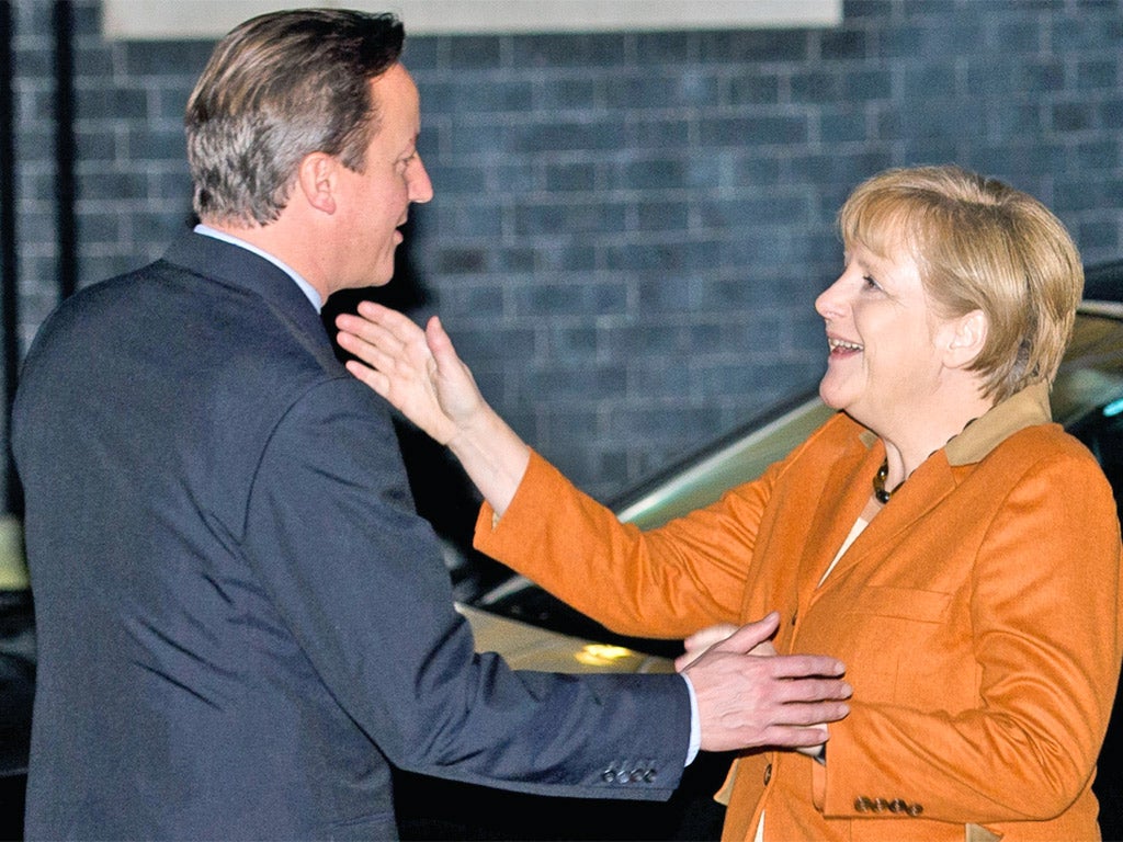 Angela Merkel is greeted by David Cameron at 10 Downing Street yesterday