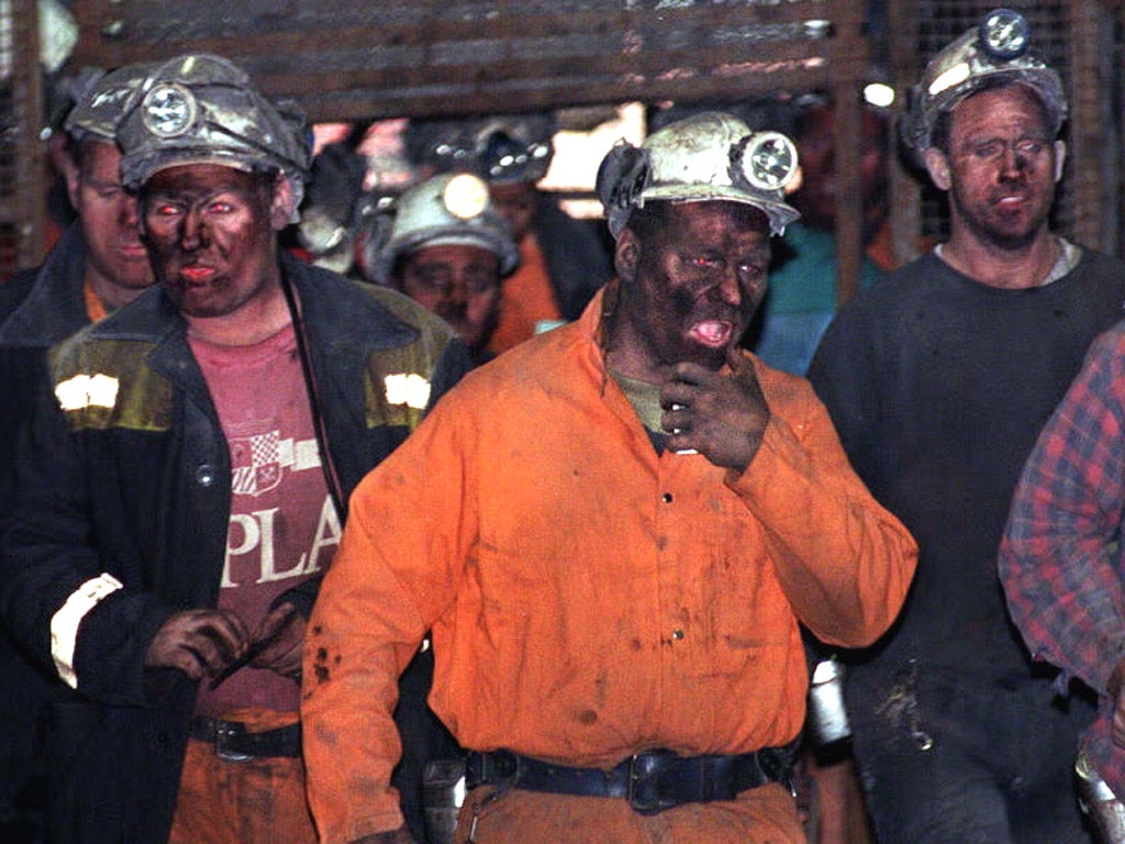 Coal Miners return to the surface after finishing a shift at Maltby