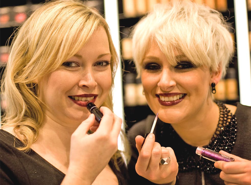 Liverpudlian ladies sample the wares in the beauty hall at the newly opened Harvey Nichols