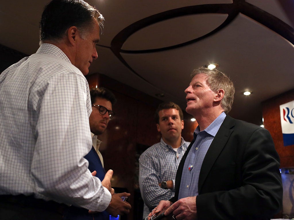 Mitt Romney with Stuart Stevens, one of his senior advisers, during the campaign