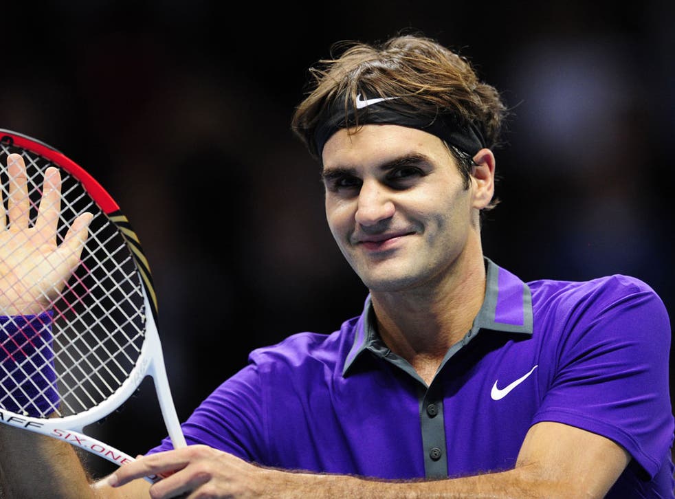 Roger Federer celebrates after his 6-4, 7-6 victory yesterday