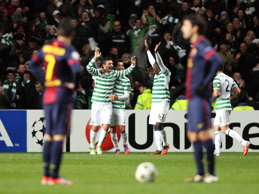 Tony Watt (second left) celebrates scoring Celtic's second goal