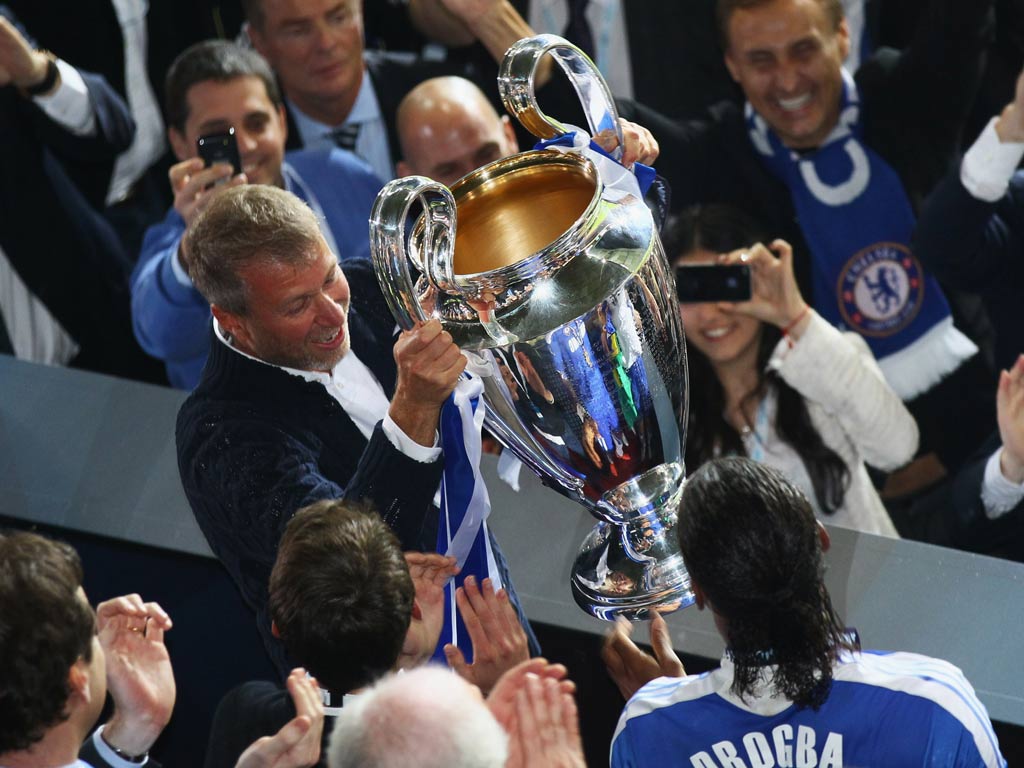Roman Abramovich celebrates with the Champions League trophy