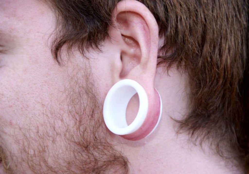 Like the tattoo, stretched ears are an unfading mark of youth: once the hole is 13mm in diameter, the ear will never return to its original size