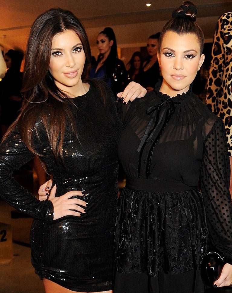 Kim Kardashian (left) and her sister Kourtney